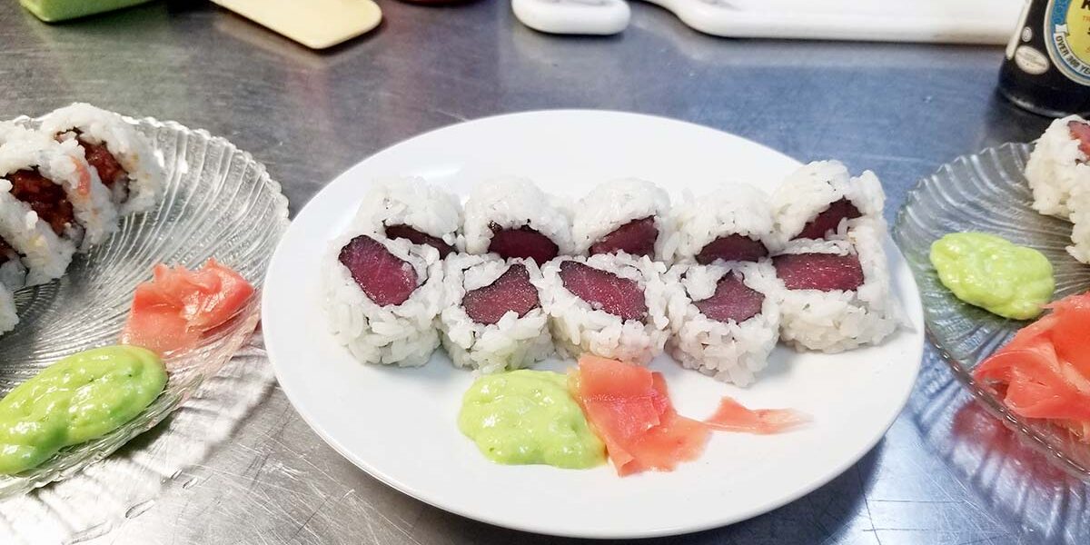 A plate of sushi on the table
